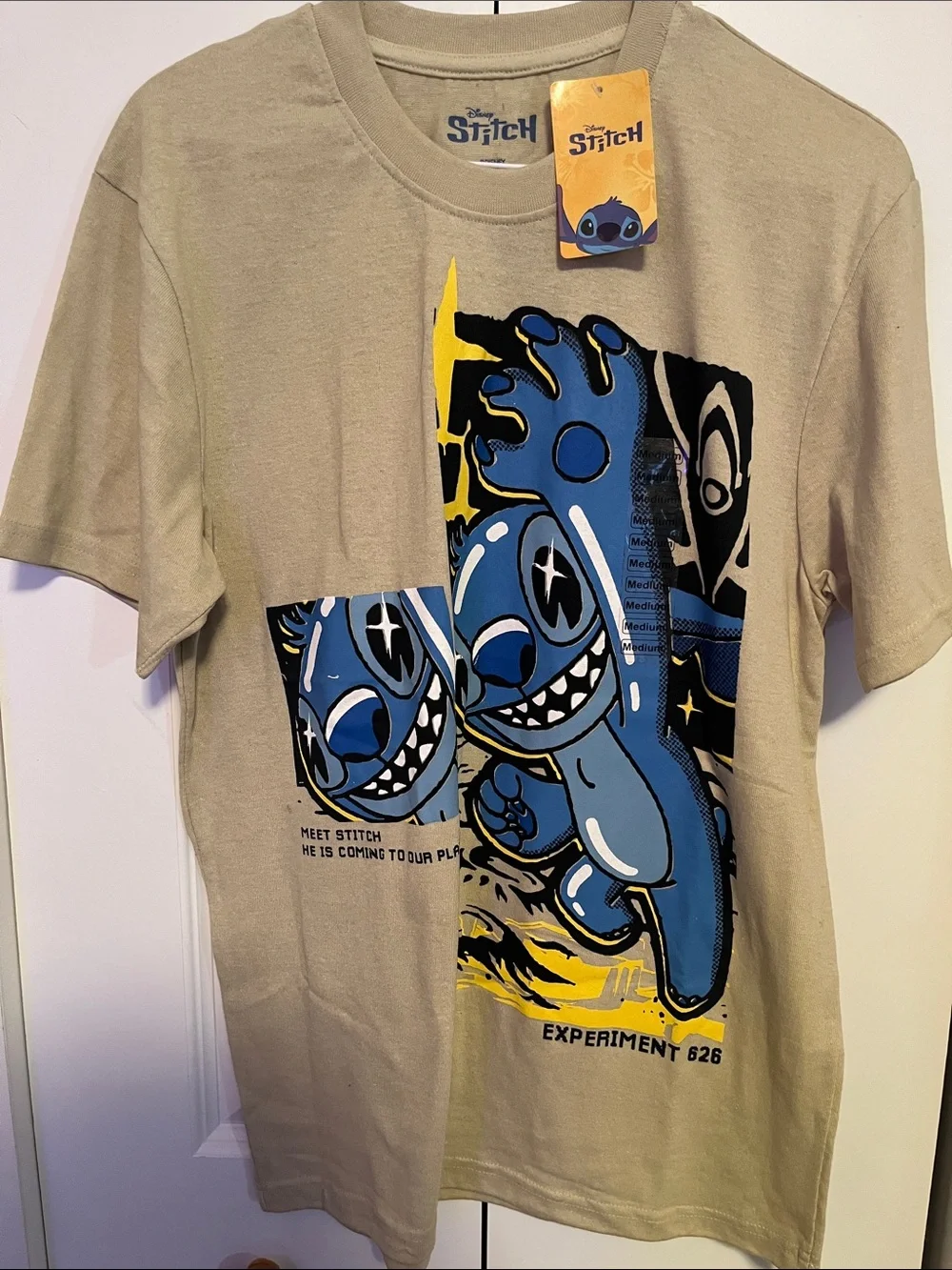 Disney Tan Tee with Blue Stitch Graphic and Yellow Accents Size Medium NWT
